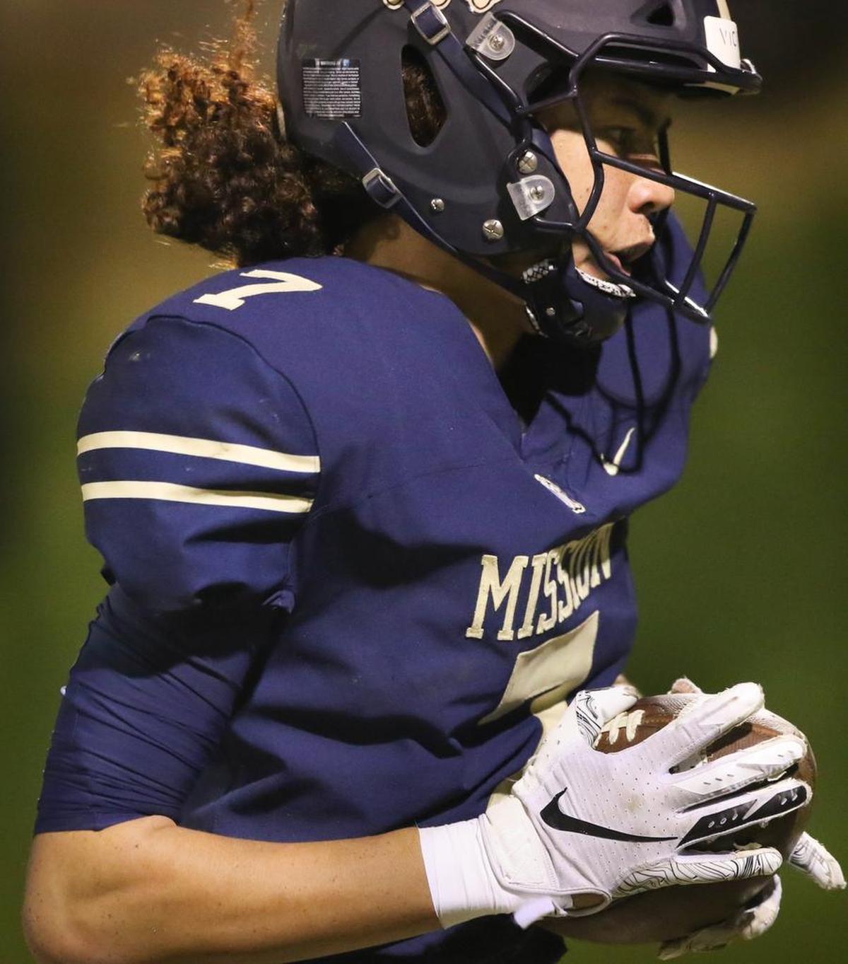 Carlton Brown catches a pass and turns to run against the Mira Monte High School Lions from Bakersfield, who visited the Mission Prep Royals in the first round of 2019 playoffs. Brown will play football at University of Nevada.