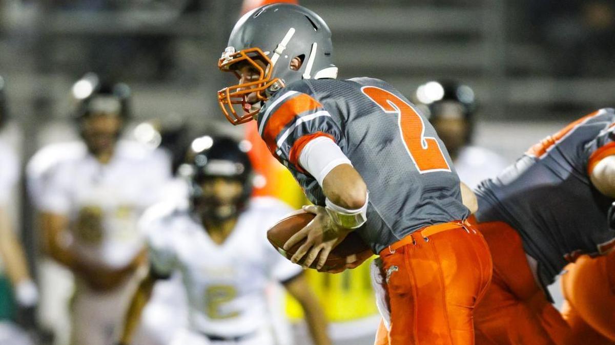 Atascadero High quarterback Carson Rinkenberg threw for 213 yards and three touchdowns in Friday night’s win over San Luis Obispo.
