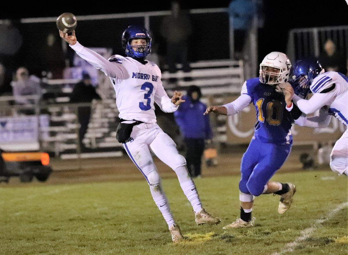 Morro Bay quarterback Nicky Johnson throws a pass in the Division 7-AA state championship at Fall River on Saturday, Dec. 11, 2021. Fall River won the state title 43-13.