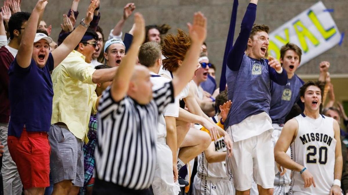 Fans react in last January’s Mission Prep and SLO High boys basketball game.