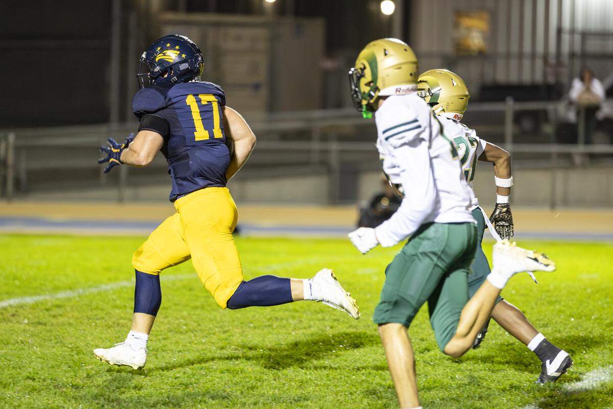 Zack Tayman dashes for a touchdown in Arroyo Grande’s 42-29 win over Garces Memorial.