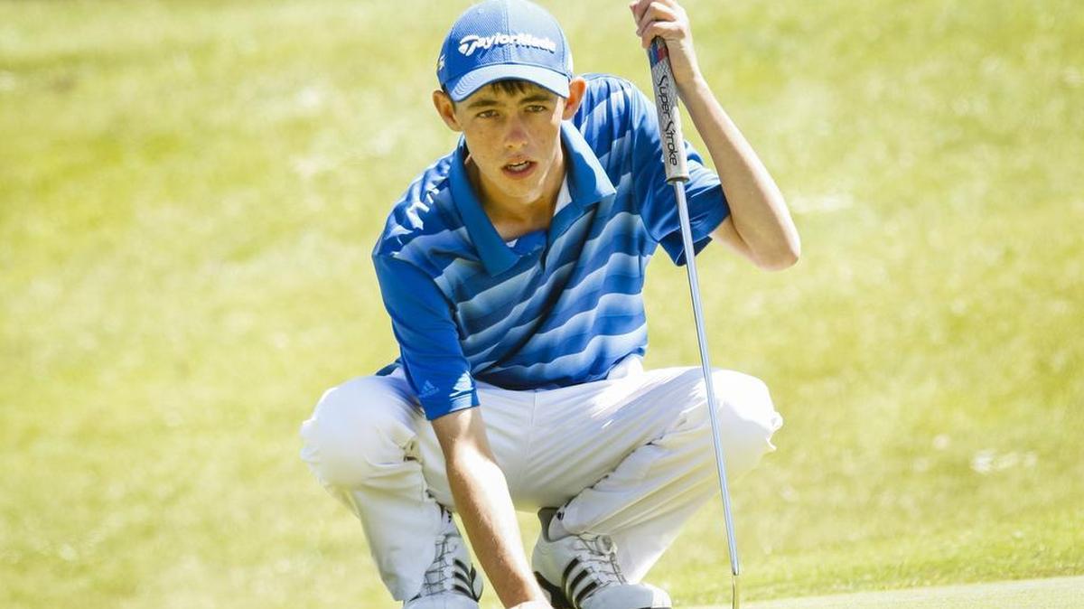 Arroyo Grande's Jack Avrit lines up his putt on the first hole against San Luis Obispo in their season finale at the San Luis Obispo Country Club.