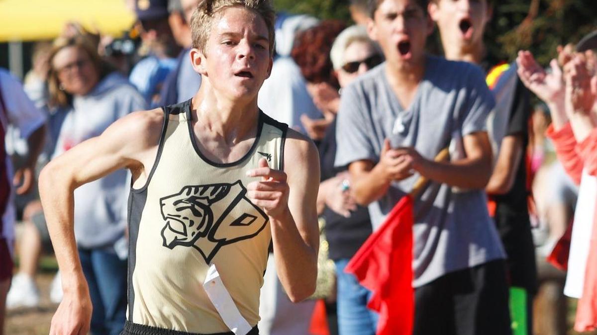 Callum Bolger of San Luis Obispo High School, shown here running cross country in the fall, won the boys 3,200-meter race Friday at the CIF-Southern Section Masters Meet in Cerritos College. He qualified for the state meet June 3-4 in Clovis.