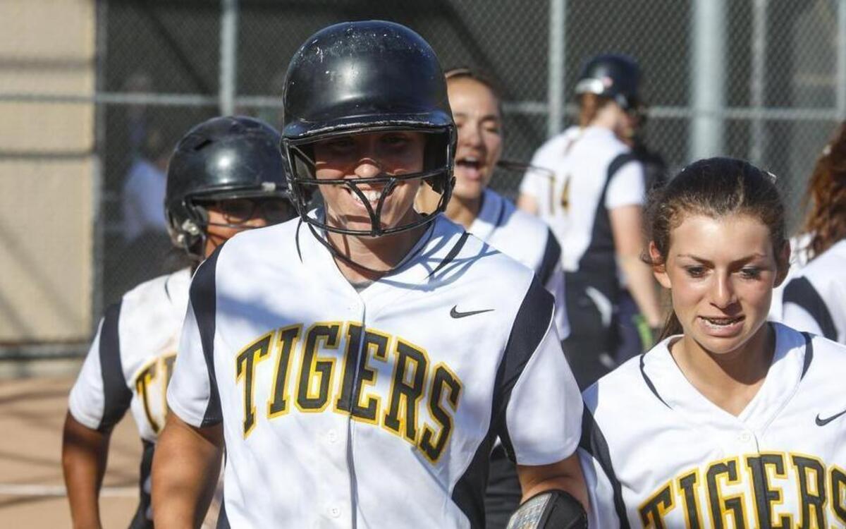 SLO High softball hosts Mission Prep in a PAC 8 game. Marissa Piatt gets congratulations for conventional home run.