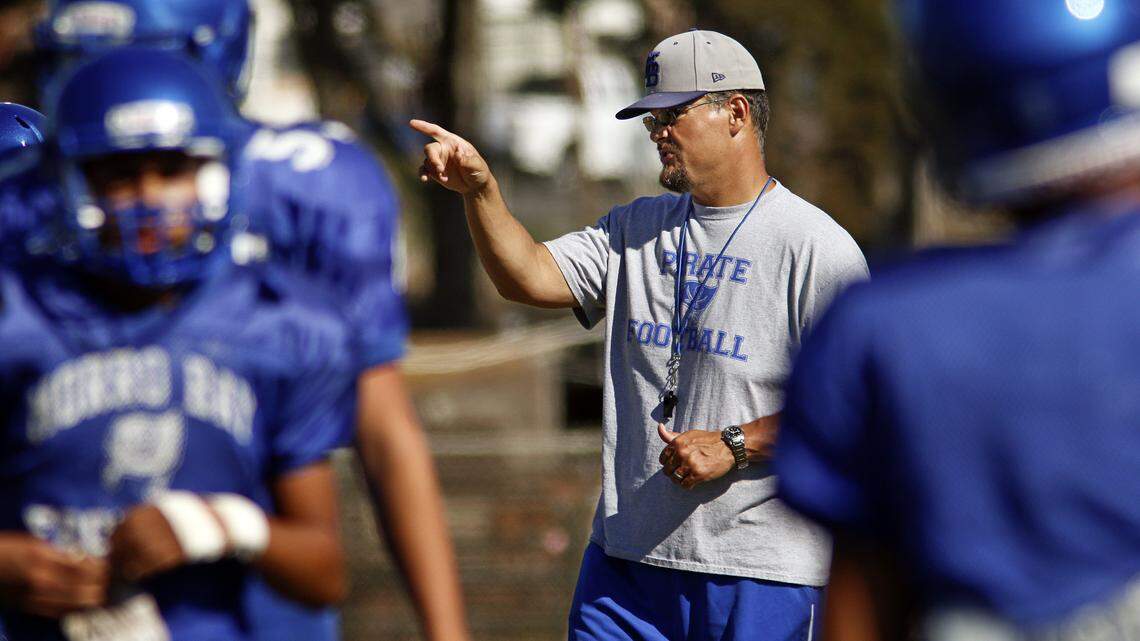 Head coach David Kelley leads a practice at Morro Bay High School football in 2015. He was removed from the job after using language insensitive to the LGBTQ community on Oct. 24.