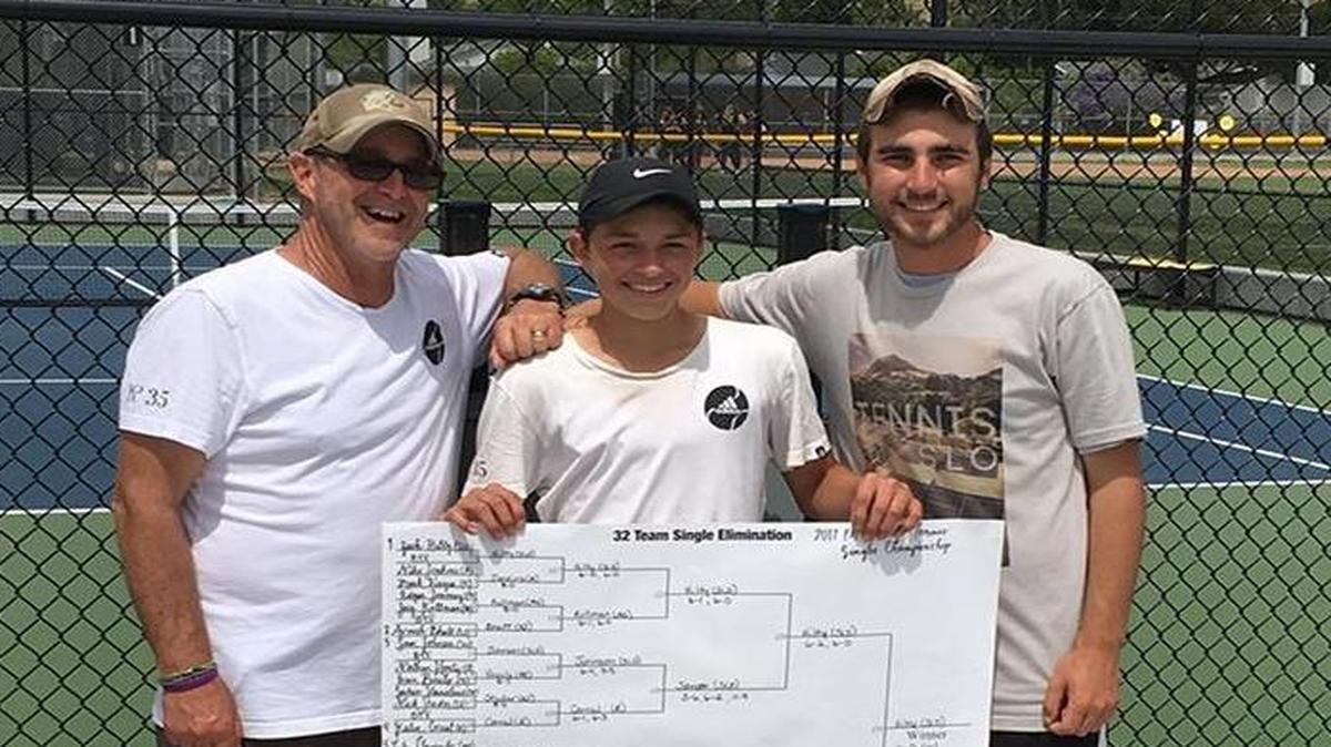 SLO High junior Zach Hilty (center) stands with coaches following his PAC 8 Singles Championship.