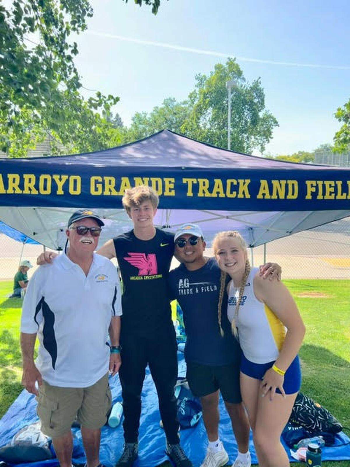 From left to right, Arroyo Grande High’s James Brown (coach), William Dawes, Geo Abuan (coach) and Madeline Scovil.