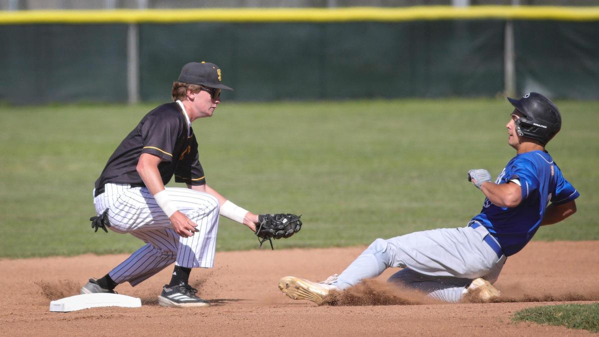 Parker Wyatt tags out Cruz Wilkinson at second base. Morro Bay beat San Luis Obispo 8-5 on May 13, 2025.