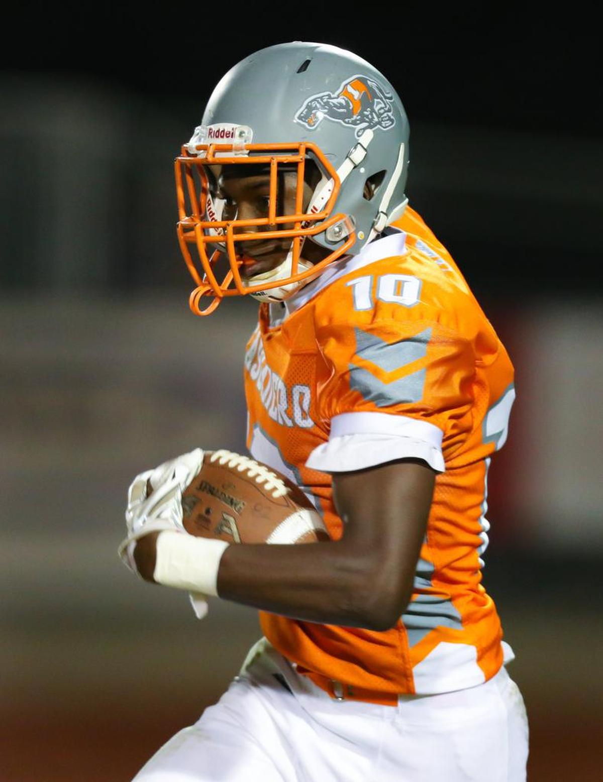 Atascadero High School’s Zyon Richardson scored on this run at the end of the first half in the Greyhounds non-conference game Friday night against Redwood from Visalia.