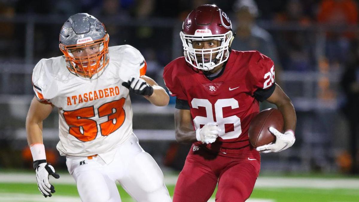 Bennie Johnson is pursued by Forrest Powell. Paso Robles hosted Atascadero for the end of the year high school rivalry football game in 2019. Football will not take place this fall due to coronavirus. It’s being moved at least into the winter.