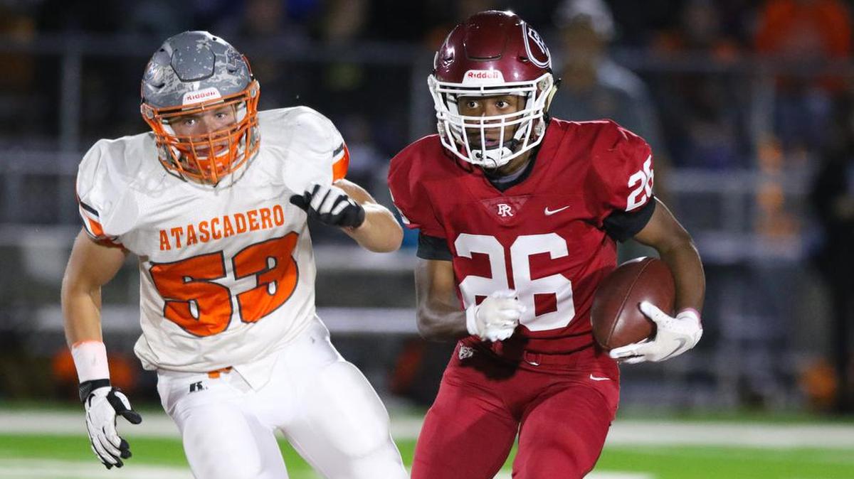 Bennie Johnson is pursued by Forrest Powell. Paso Robles hosted Atascadero for the two schools’ rivalry football game in 2019. This year’s football season remains in question amid COVID-19.