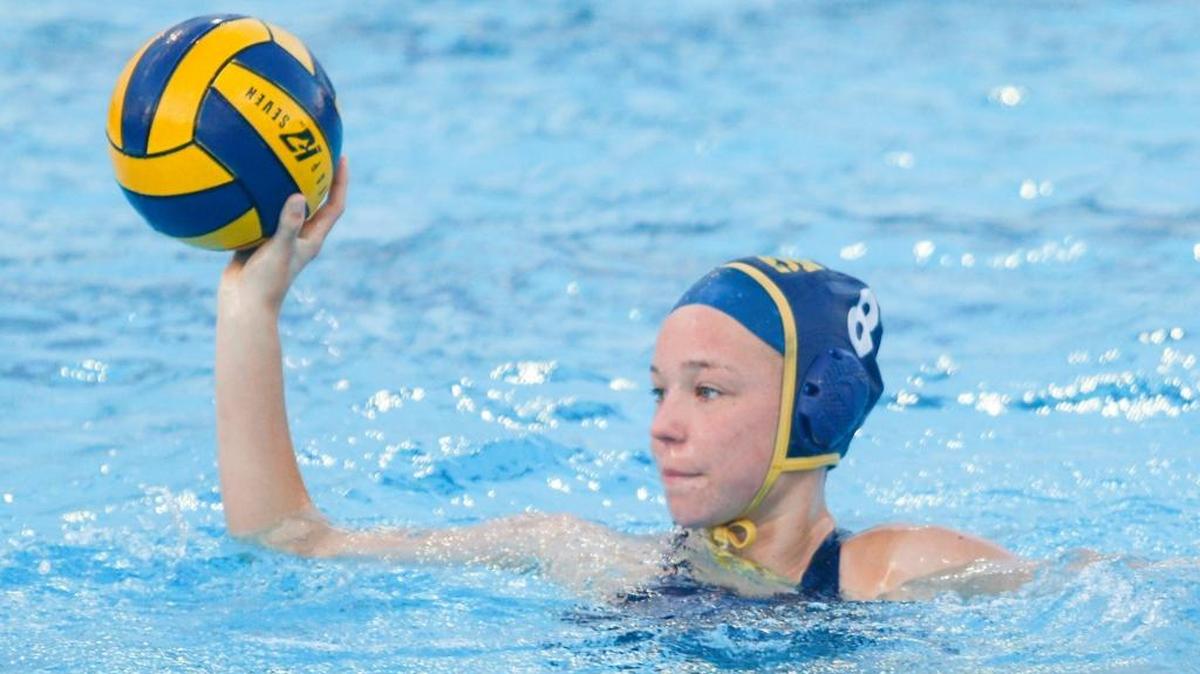 Arroyo Grande High’s Sam Vitt passes the ball in a win over Righetti in a girl’s water polo match last month.