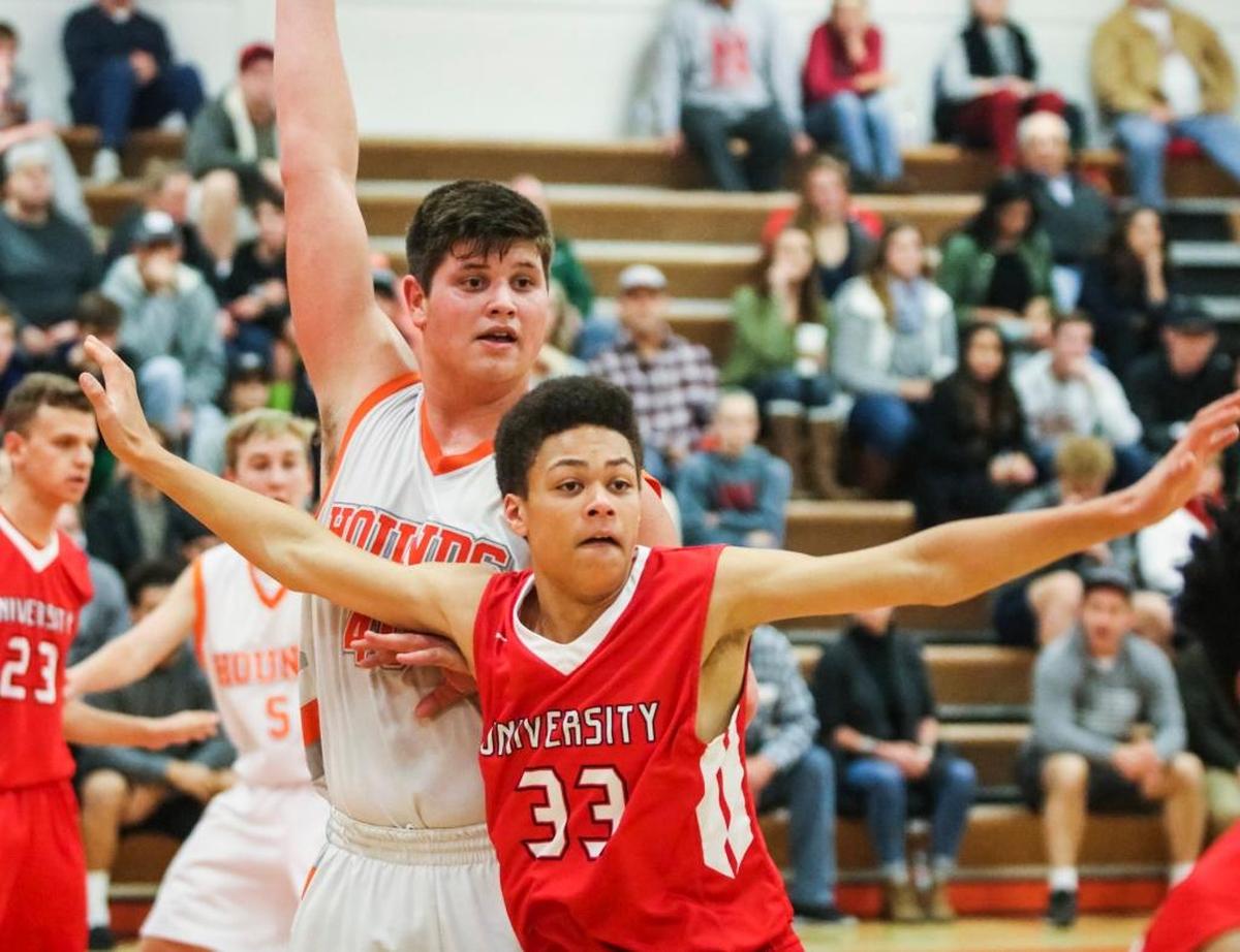 Atascadero senior Kyler Warren (wearing white) is averaging more than 19 points and 13 rebounds through the first 13 games of the season.