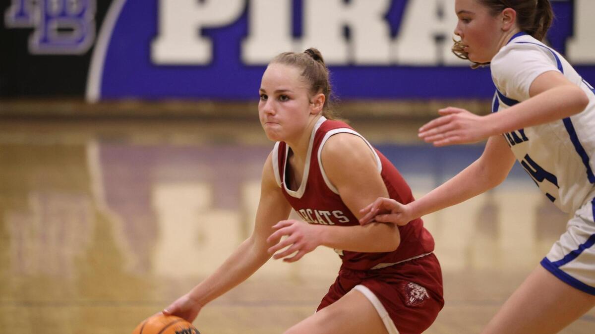 Riley Milder dribbles as Violet Pace defends. Morro Bay beat Paso Robles 47-38 on Jan. 9, 2024.