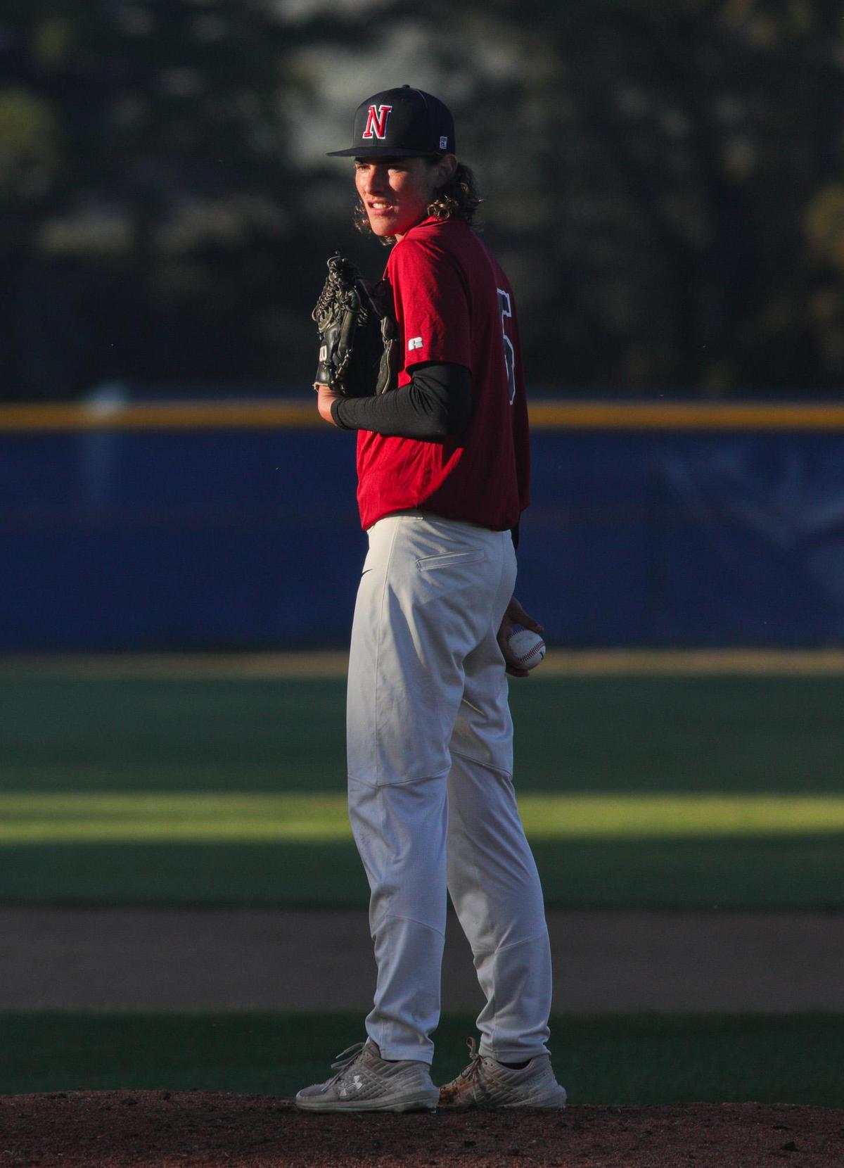 Lukas Ward looks in for a sign while pitching for the Titans. Morro Bay Pirates won 11-1 over Nipomo Titans in boys high school baseball March 22, 2022.
