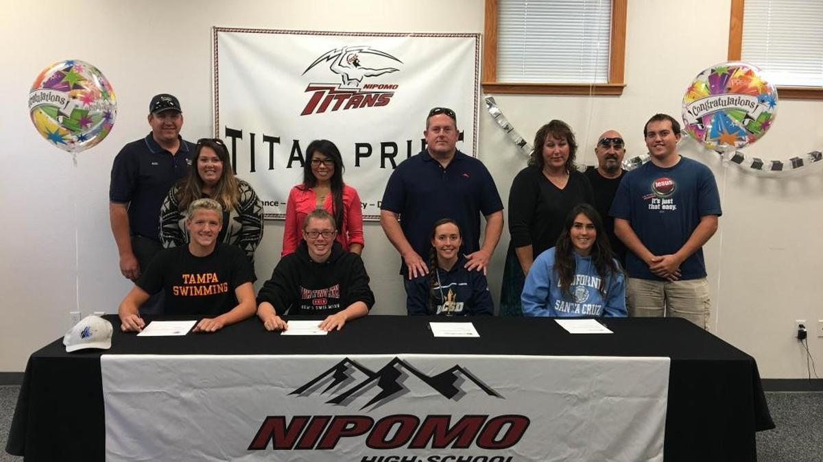 Nipomo High athletes (From Left) Austin Simpson, Tyler Melsheimer, Alayna Gocke, Jordynn Dorado sign NLIs backed up by their families.