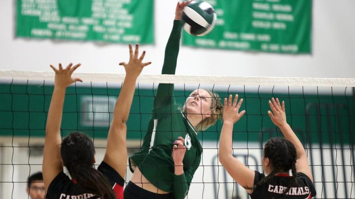 Templeton High junior Lauren Reeves goes for the kill in a CIF-Southern Section Division 6 playoff match against Whittier.