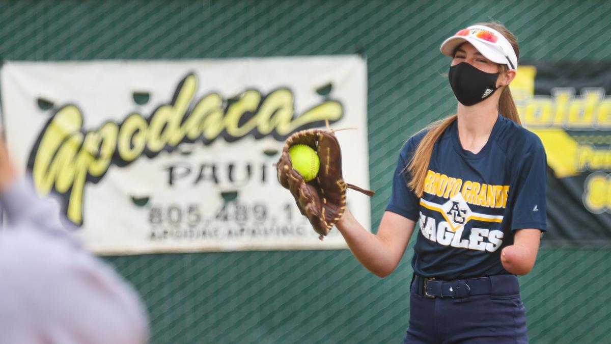 Riley Osborne, a sophomore outfielder at Arroyo Grande High School, catches and throws using only her right arm.