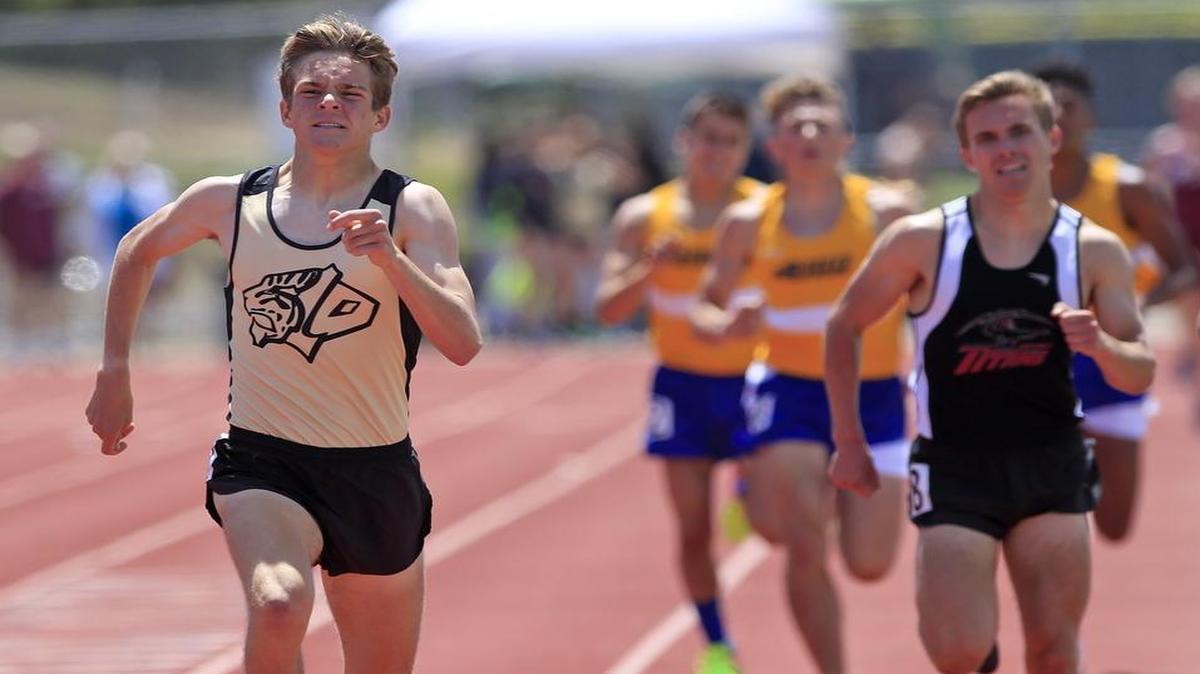 The San Luis Obispo County Track and Field meet was held at Cuesta College, Saturday, April 22, 2017. San Luis Obispo's Callum Bolger (1), left, pulls ahead of challengers in the Men's Varsity 800-meter race.
