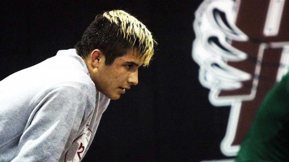 Paso Robles senior Julian Madrigal takes a breather during a recent wrestling practice. He will compete this weekend at the CIF-Southern Section Masters for a spot in the CIF State Championships.