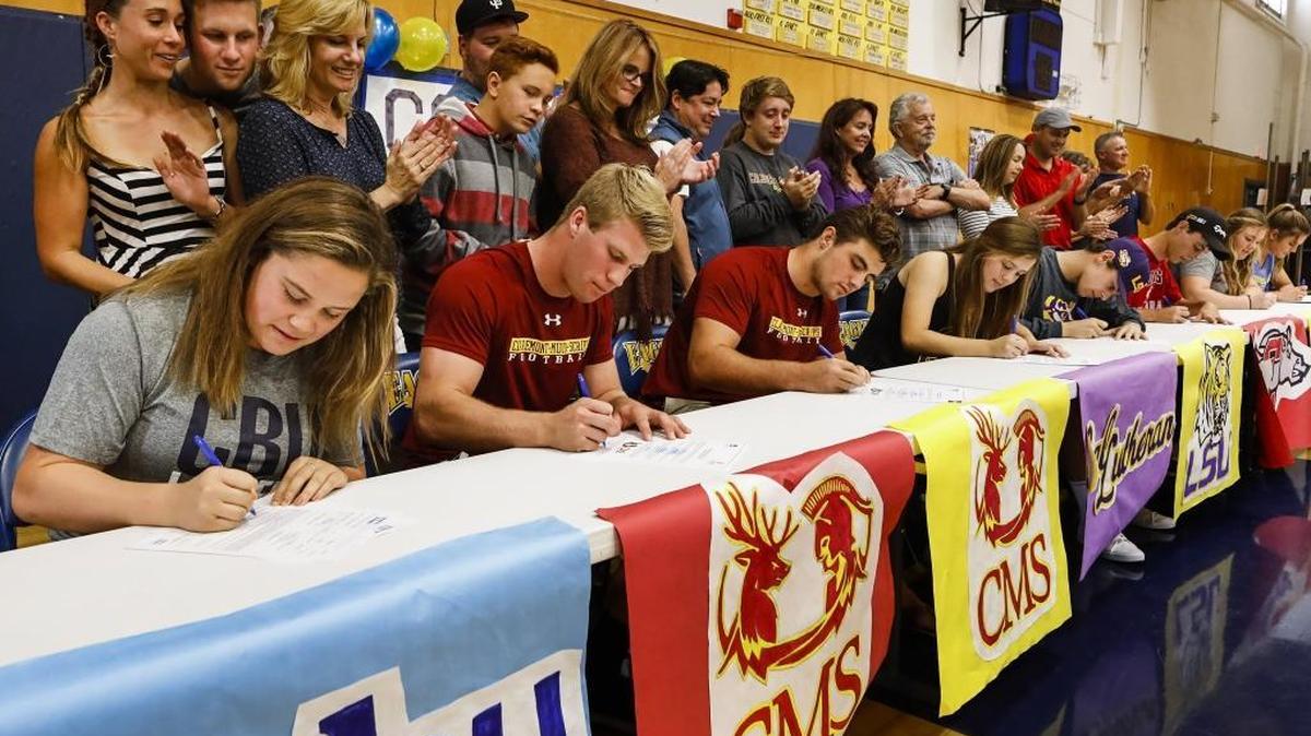Eight Arroyo Grande High athletes sign National Letters of Intent Thursday. (From left) Hannah Parson, Swimming, Cal Baptist; Matt Sill, Football, Claremont McKenna; Sam Ness, Football, Harvey Mudd; Kate Boller, Soccer, Cal Lutheran; Trent Schachter, Swimming, LSU; Jack Avrit, Golf, Santa Clara; Julie Lewis, Softball, Iowa State; Kacie Burger, Softball, Colorado Christian. Photo by Joe Johnston 11-10-16