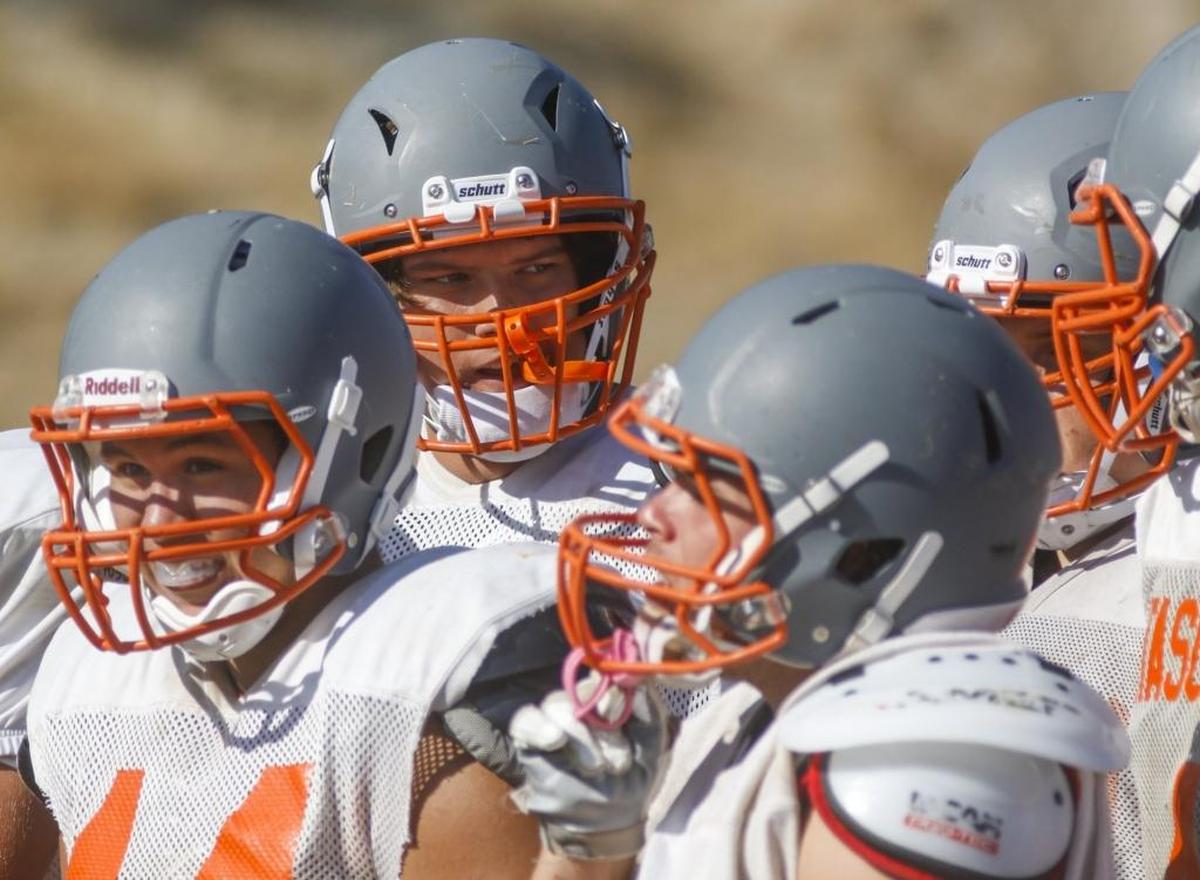 Atascadero High senior Alex Cooper (center) has asserted himself as a leader of the team and the offensive line. David Middlecamp 8-15-2017