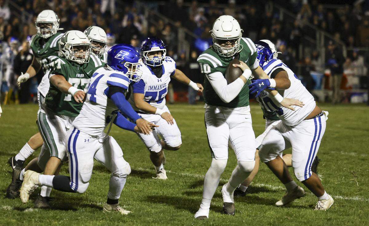 Quarterback Colter Tannehill was pressured by the rush most of the game. Immanuel beat Templeton 48-7 in the CIF Central Section Div. IV Championship on Nov. 28, 2025.