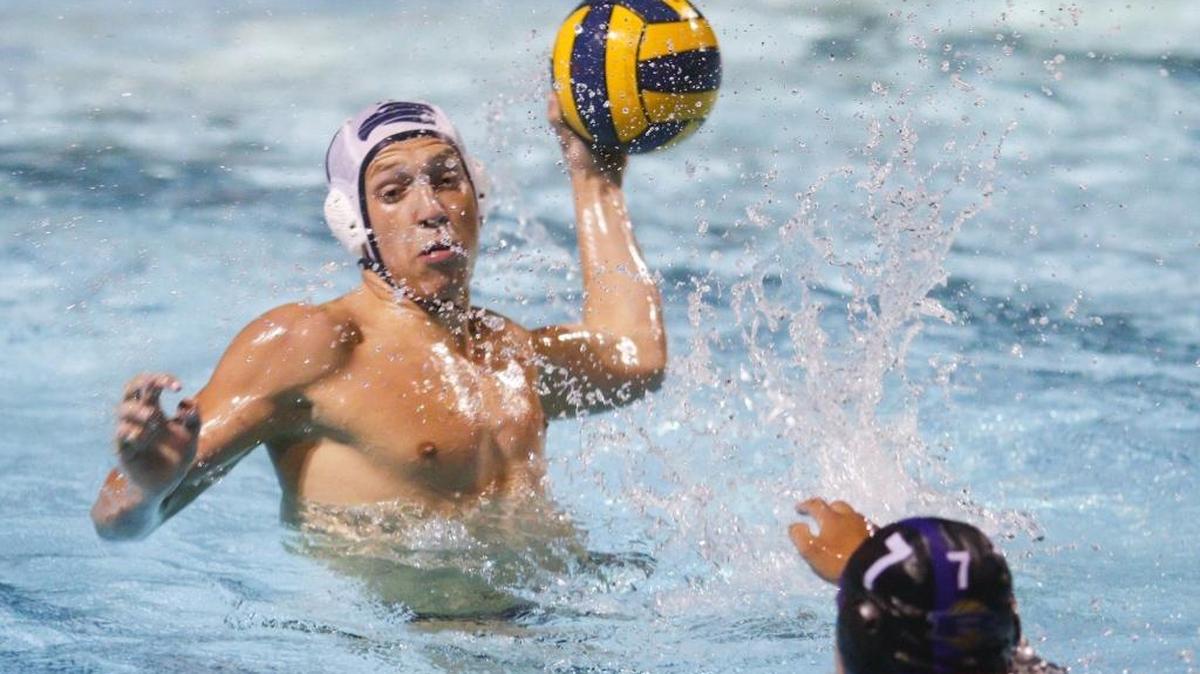 Chase Taylor of Arroyo Grande takes a shot against Righetti at the PAC 8 boys water polo tournament in Arroyo Grande.