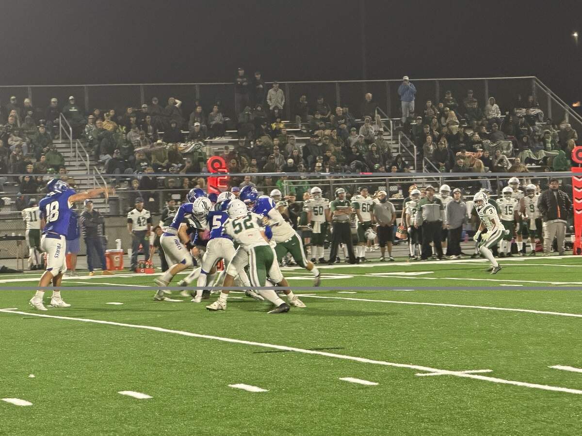 John Holguin throws a pass for Morro Bay.