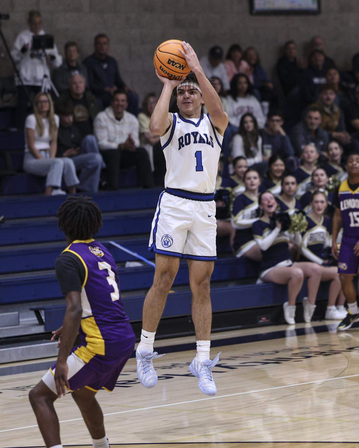 Hunter Drake takes a 3 point shot. Mission Prep boy's basketball team beat Lemoore 69-43 on Feb. 13, 2026 in the first game of ;the playoffs.