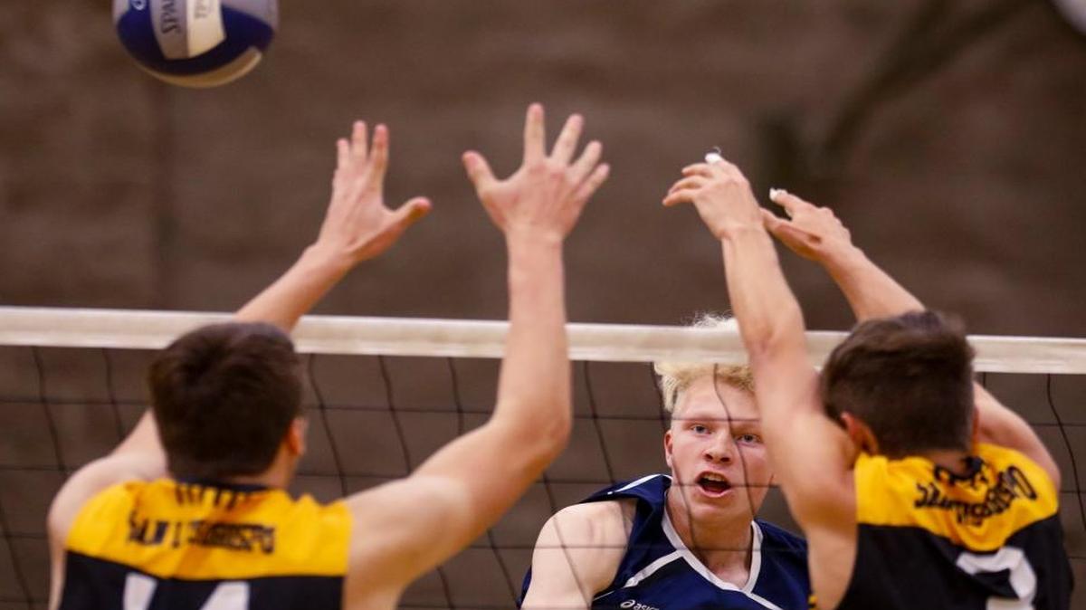 Arroyo Grande junior Jackson Tourdot smacks a kill in a game against SLO High. Photo by Joe Johnston 03-31-17