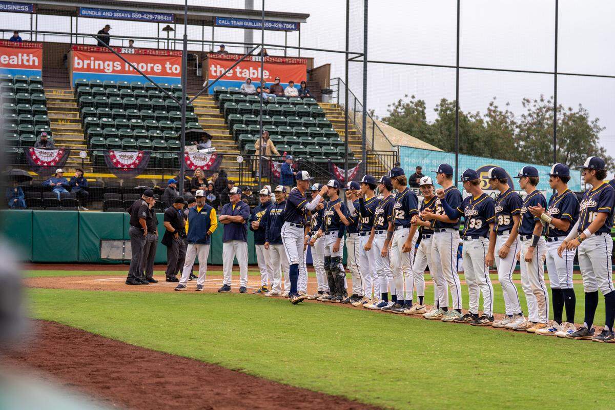 Arroyo Grande players line up before the game.