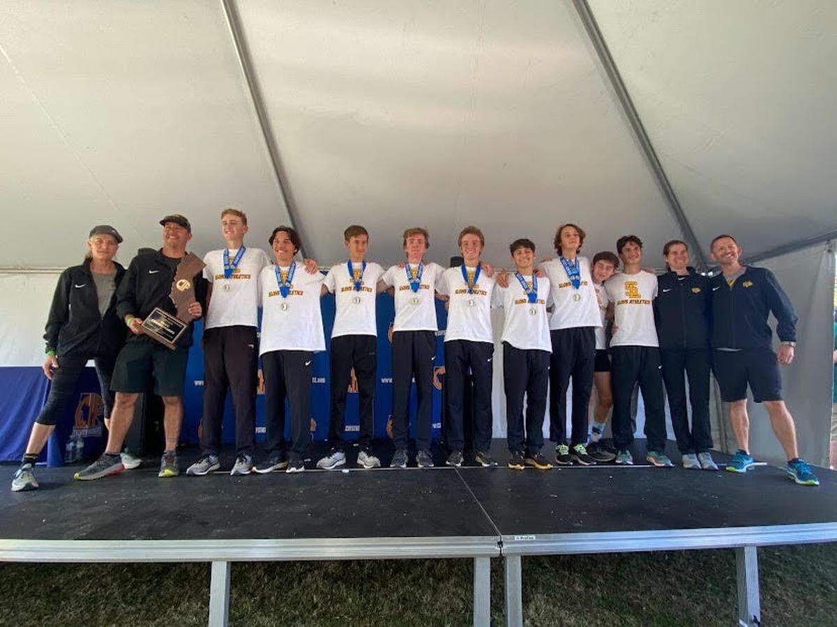 The 2021 SLO High’s boys cross country team celebrates its Division 2 state championship. It was the Tigers’ first in Division 1; they previously won in Division 3).