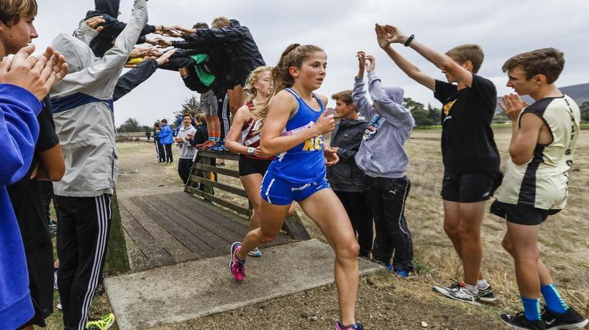 Arroyo Grande’s Malia Simon won the girls race at the SLO County Cross Country Championships on Thursday at Laguna Lake Park.