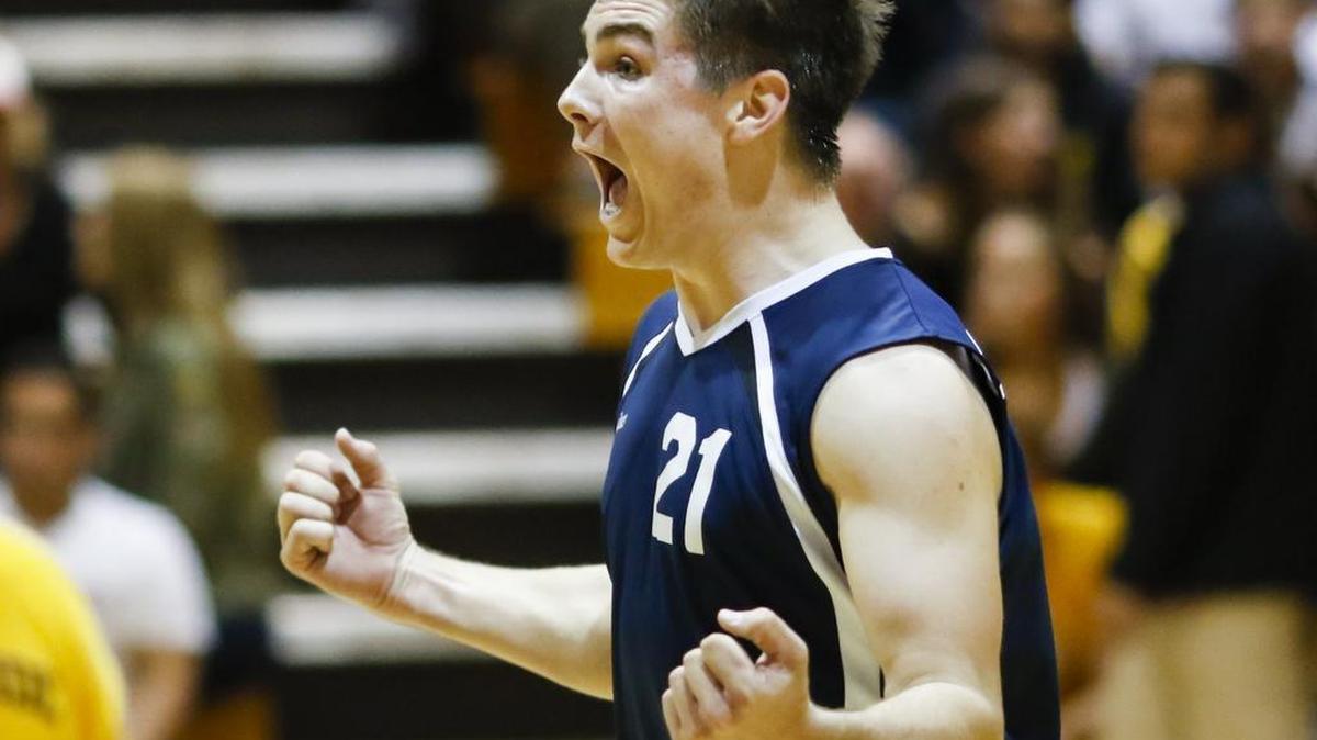 Eagle Ryan Meffert celebrates a point. San Luis Obispo High School hosted Arroyo Grande for a boy's volleyball match.