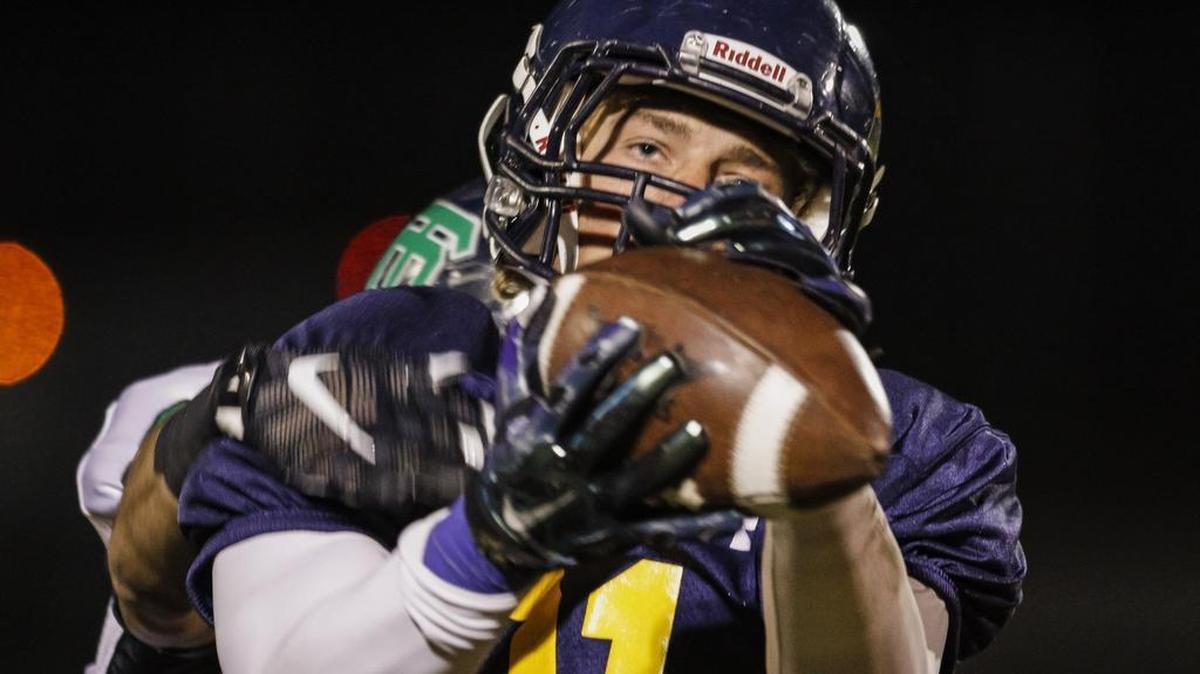 Arroyo Grande High tight end Joel Bishop makes a catch during Friday night’s playoff game in Arroyo Grande.