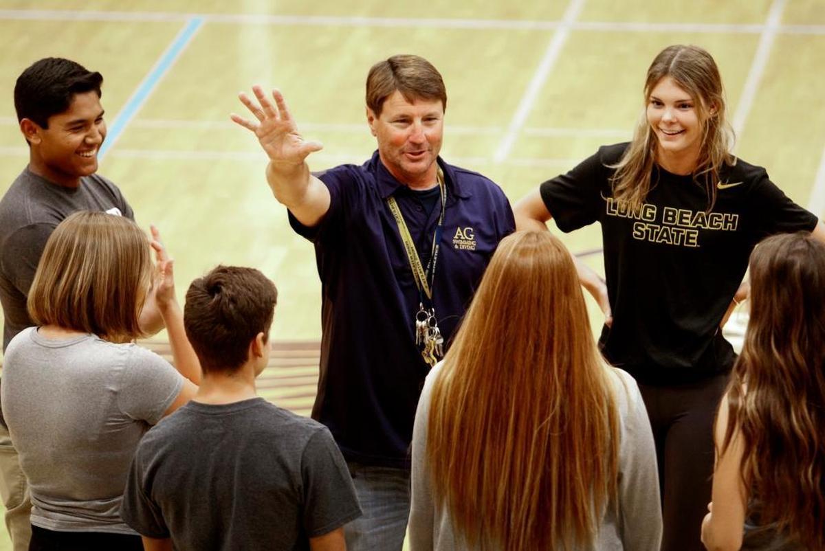 Dwight MacDonald talks to 13 Arroyo Grande student-athletes before they sign their National Letters of Intent. Photo by Joe Johnston 04-13-17