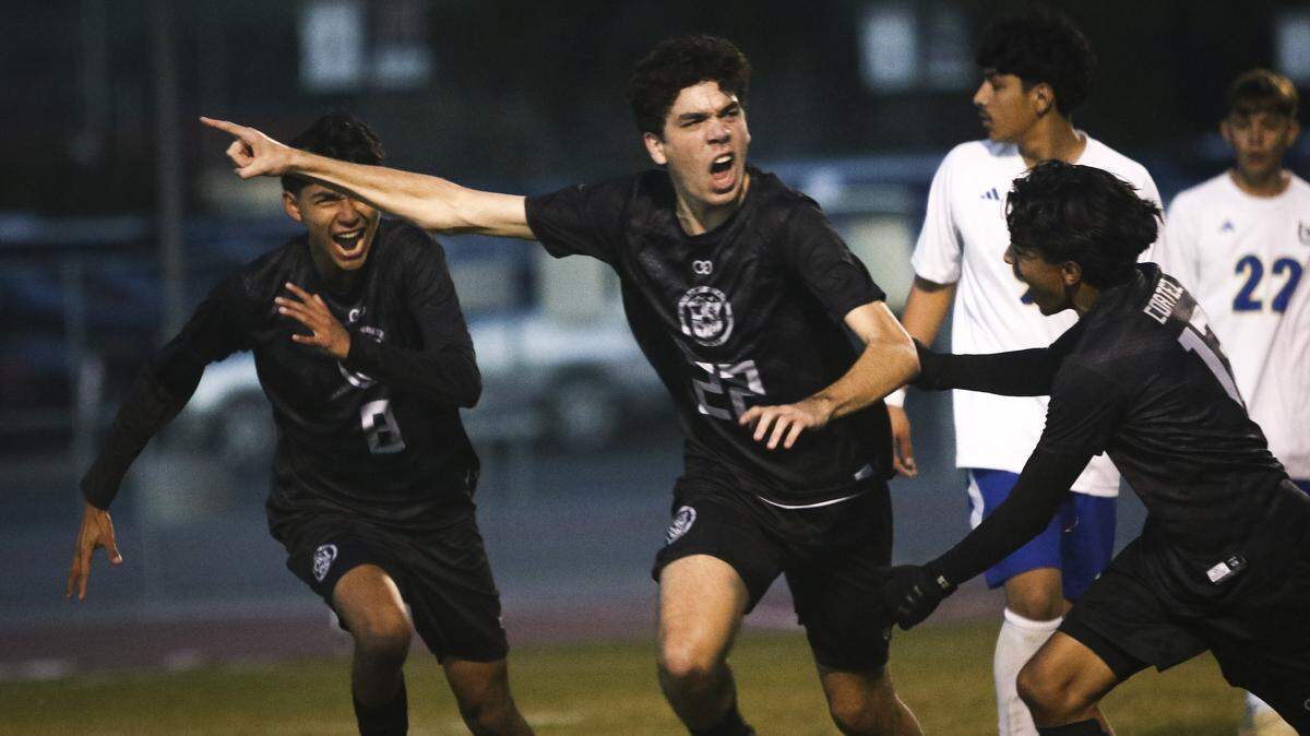Finnean Callaghan, center, celebrates the first goal of the game. Nipomo beat Dos Palos 6-1 to win the Division V 2026 CIF Central Section Boys Soccer Championship on Feb. 25, 2026.