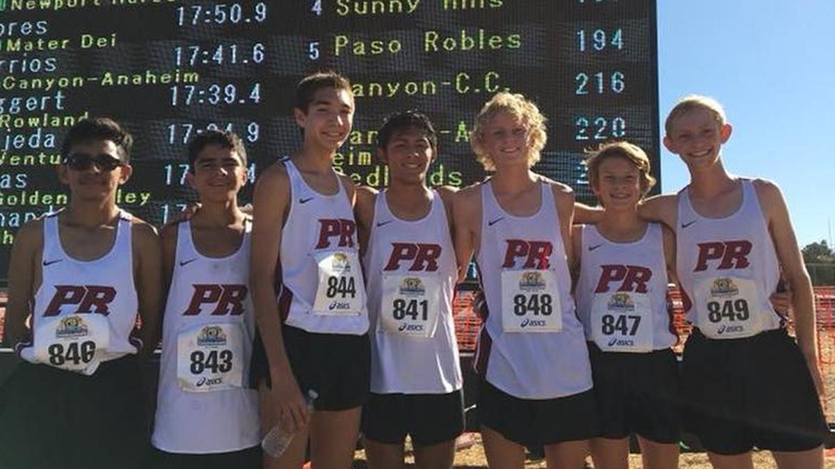 The Paso Robles High boys cross country team poses after finishing fifth in the CIF-Southern Section Division 2 race to qualify for the CIF state meet.