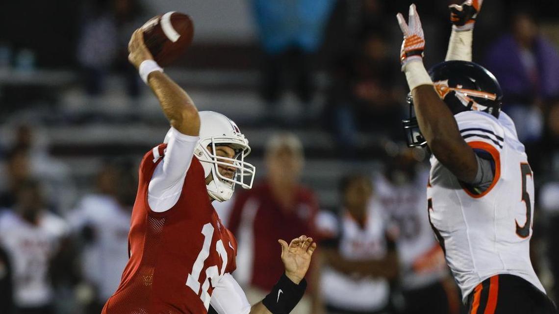 Zach Hanson is under pressure. Paso Robles High football hosts McClymonds in a non-league game.