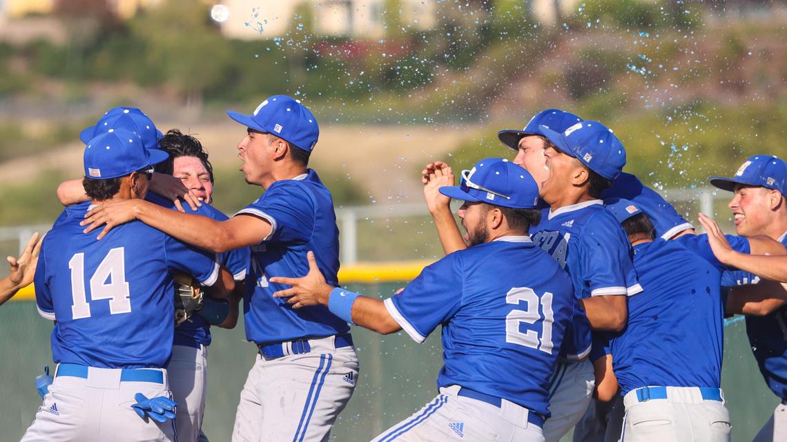 Madera players celebrate the final out a 9-1 CIF Championship win. Arroyo Grande hosted Madera in the CIF Division 2-Central Section Championship.