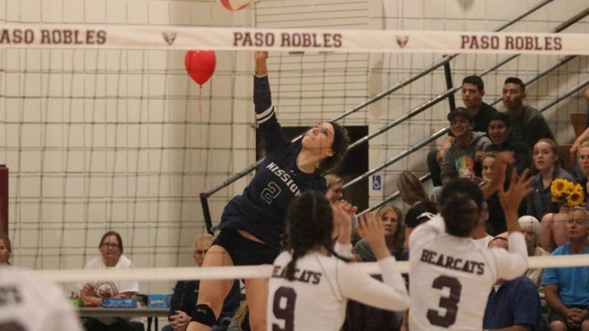Mission Prep senior Sarah Reed goes for a kill against Paso Robles.