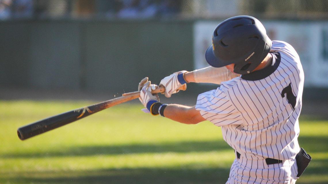 Jake Hixenbaugh breaks his bat on an infield single in the San Luis Obispo Blues’ game against the Santa Barbara Foresters on July 3, 2023.