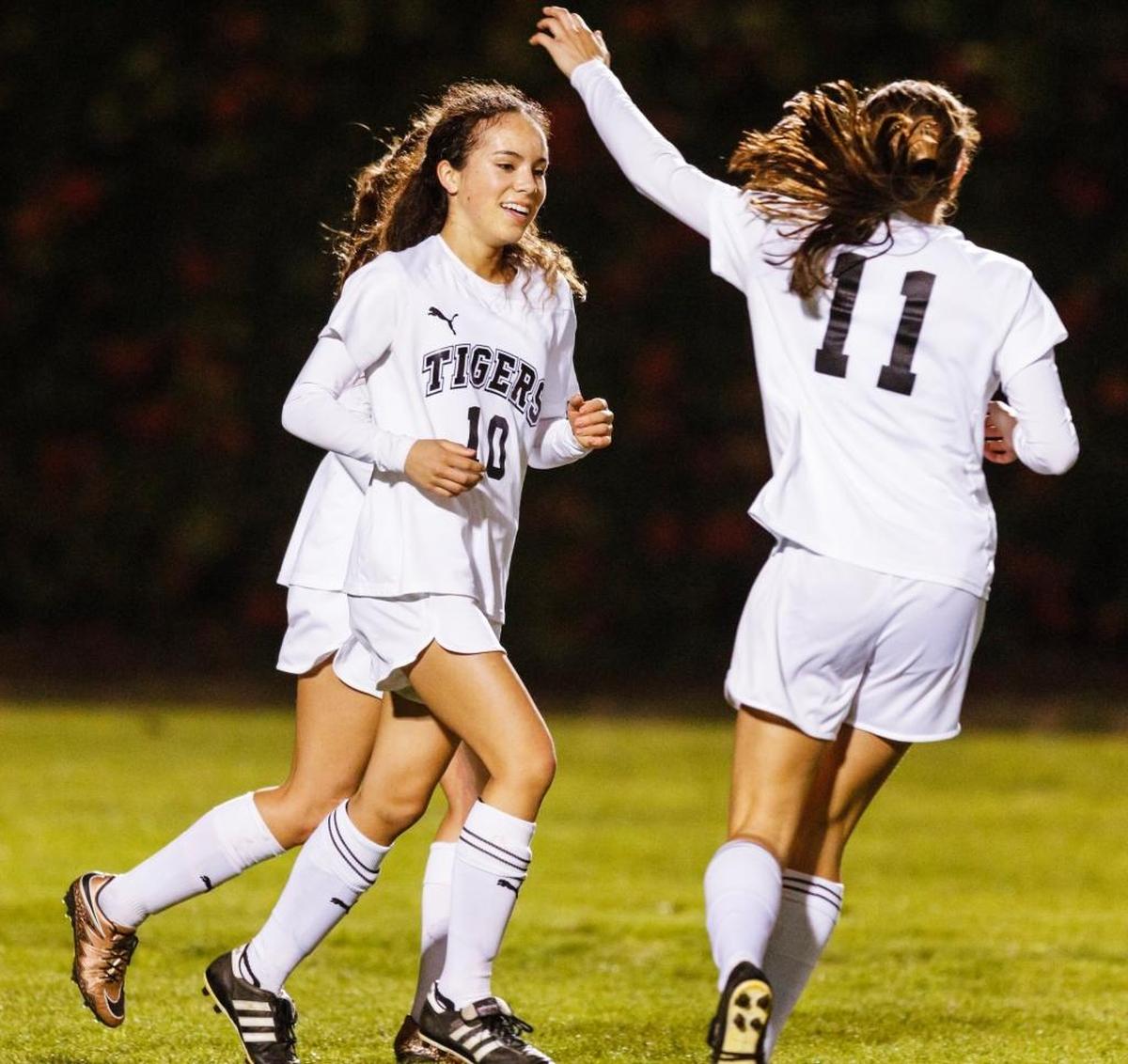 Amelia Corpuz-Carr celebrates a goal in the semifinals of the Division 3 state playoffs in 2016. Photo by Joe Johnston 03-10-16