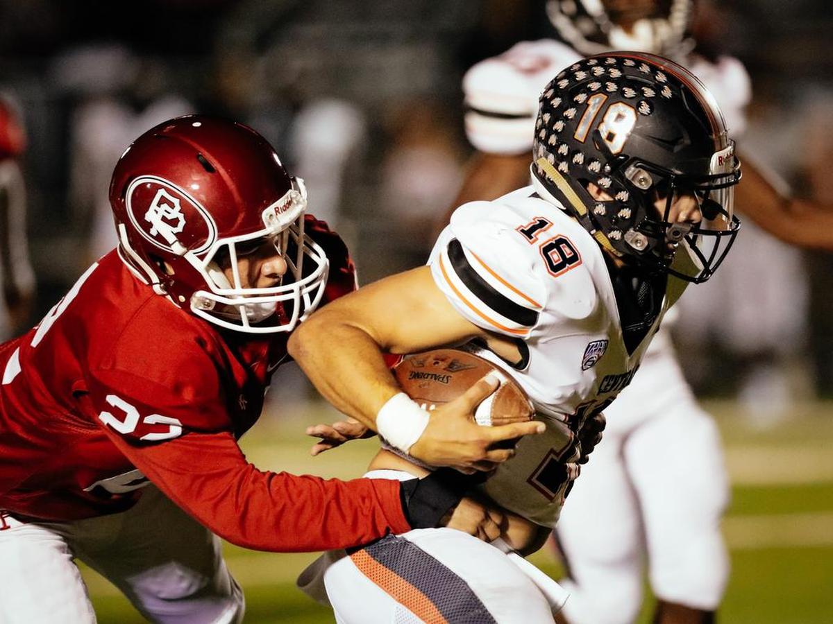 Central High quarterback Trent Tompkins runs against Paso Robles on Sept. 7, 2018.