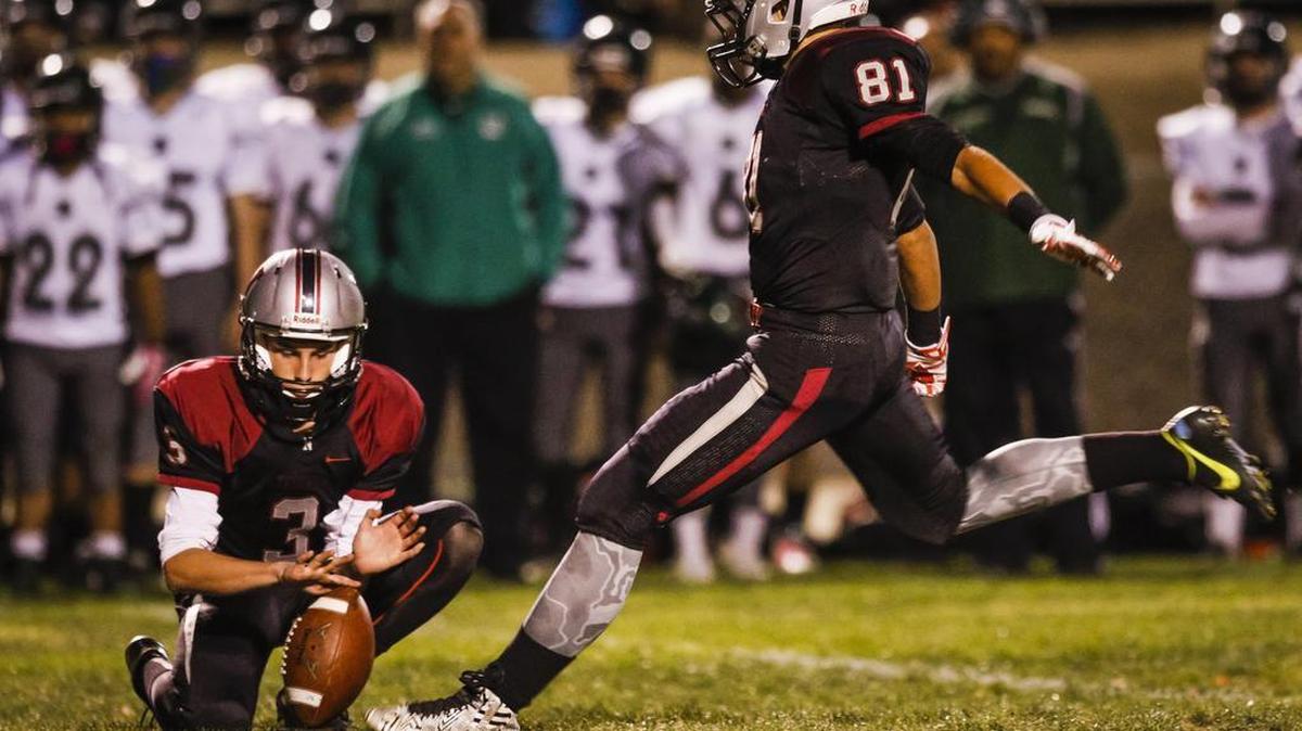 Nipomo High’s Juan Eguiluz attempts a field goal in the second quarter against Twentynine Palms during Friday’s playoff football game.