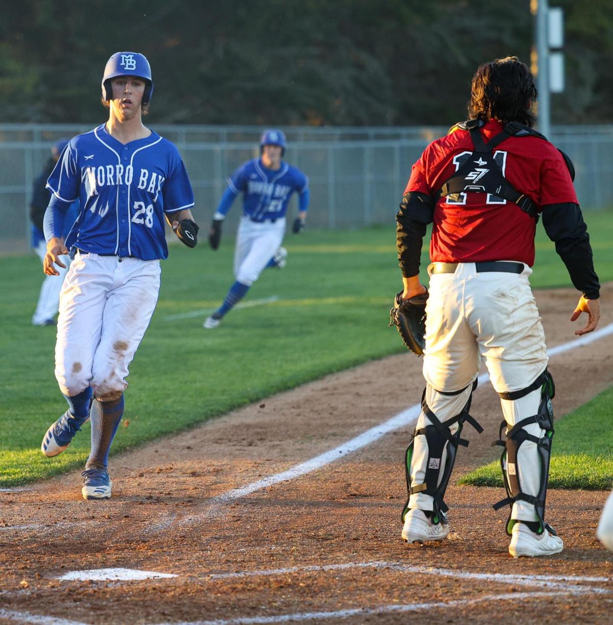 Two runs scored on this play, Morgan Codron was the first and Jackson Howell. Morro Bay Pirates won 11-1 over Nipomo Titans in boys high school baseball March 22, 2022.