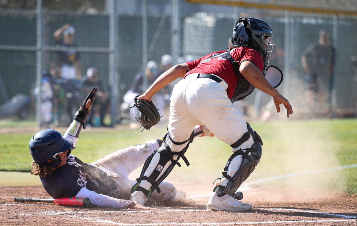 James Bishop was tagged out by catcher Jesse Ahedo at home. Arroyo Grande won 12-1 over Nipomo May 17, 2022 in a baseball game at Arroyo Grande High School.