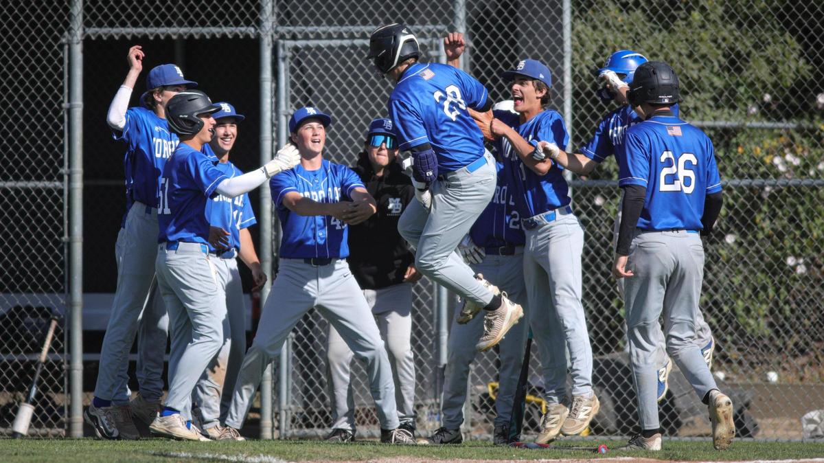Evan Davis jumps celebrating his two run home run that started the scoring. Morro Bay beat San Luis Obispo 8-5 on May 13, 2025.