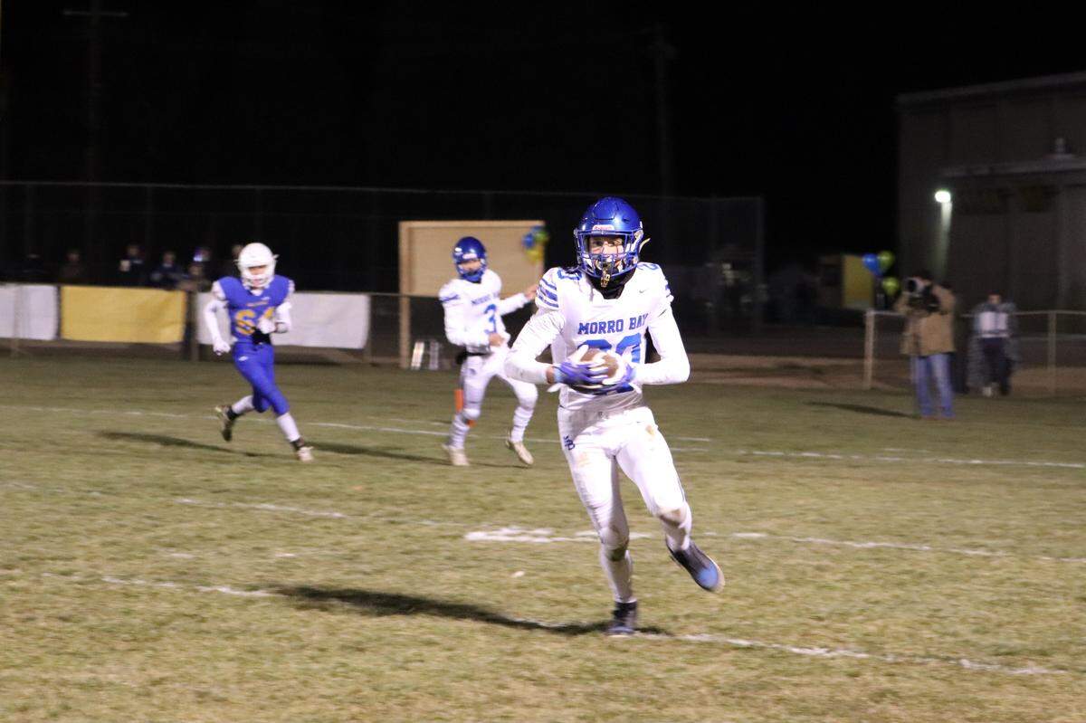 Morro Bay runs with the ball.